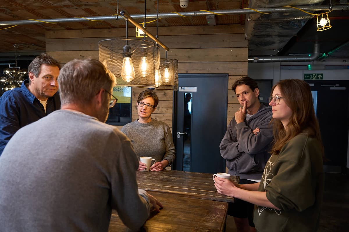 Founders from the Akcela community catching up over coffee at Fuel Studios in Norwich